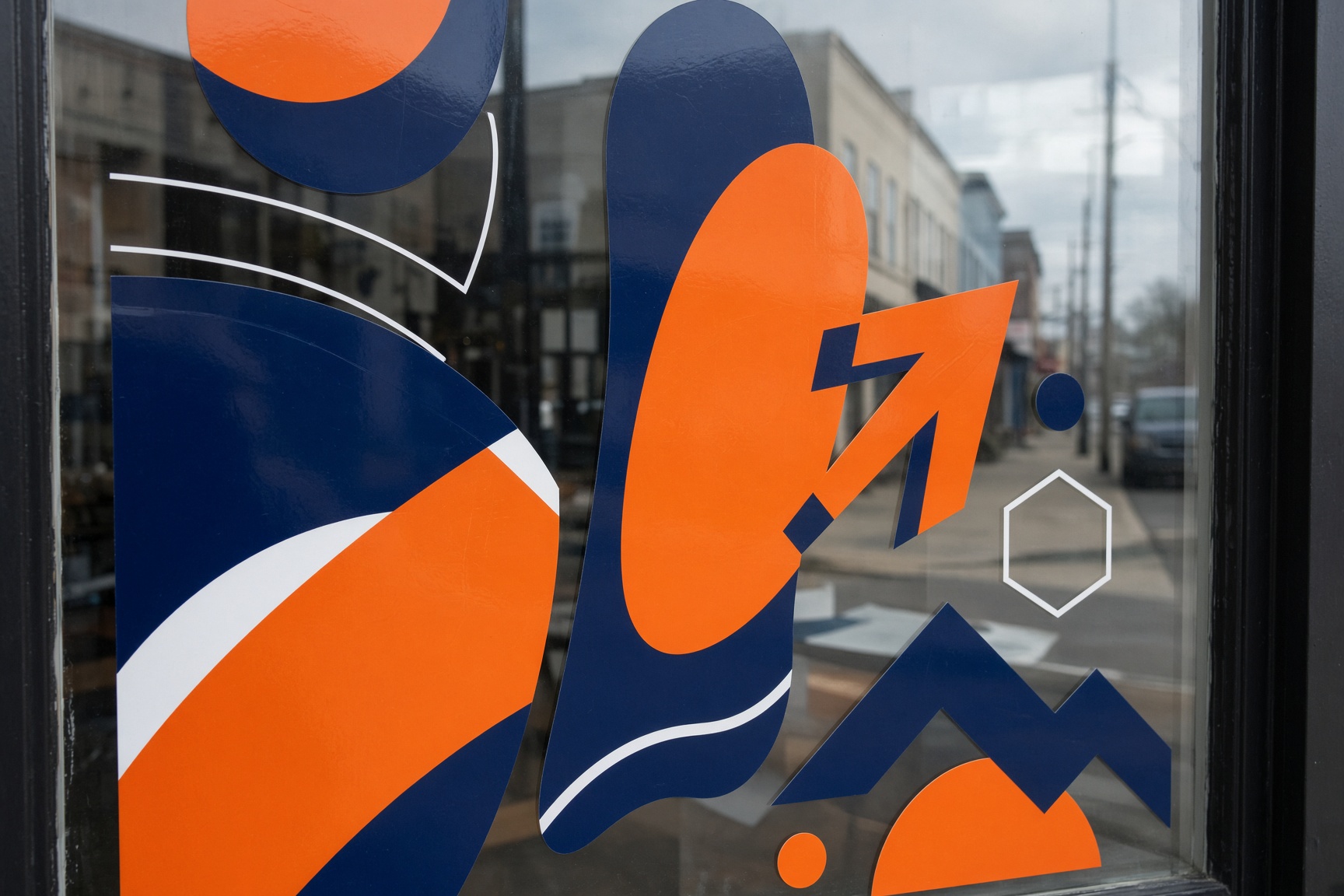 Vinyl window graphics applied to storefront glass.